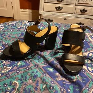 Naturalized black chunky heels